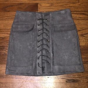 Crisscross suede mini skirt.